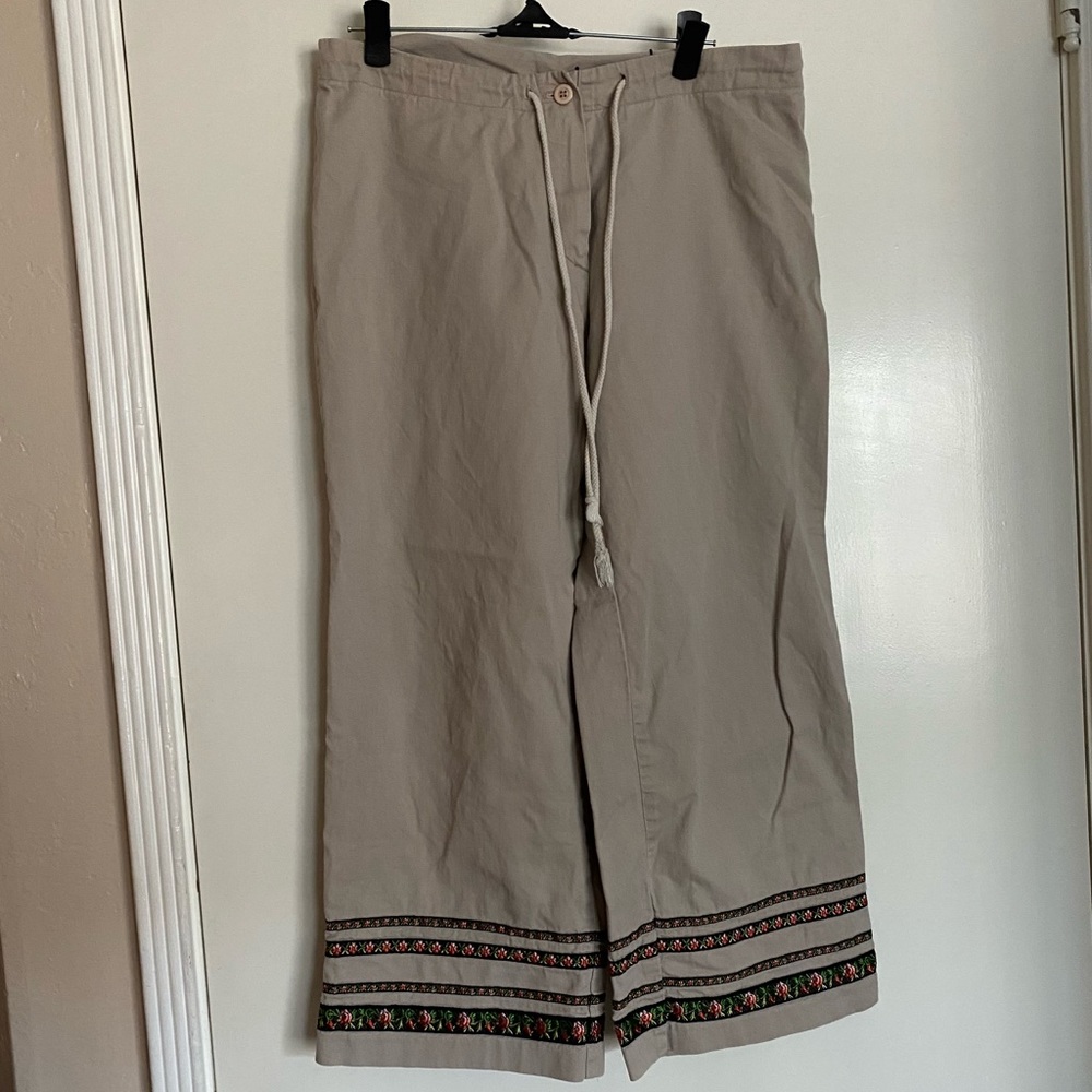 tan capri pants with floral embroidery